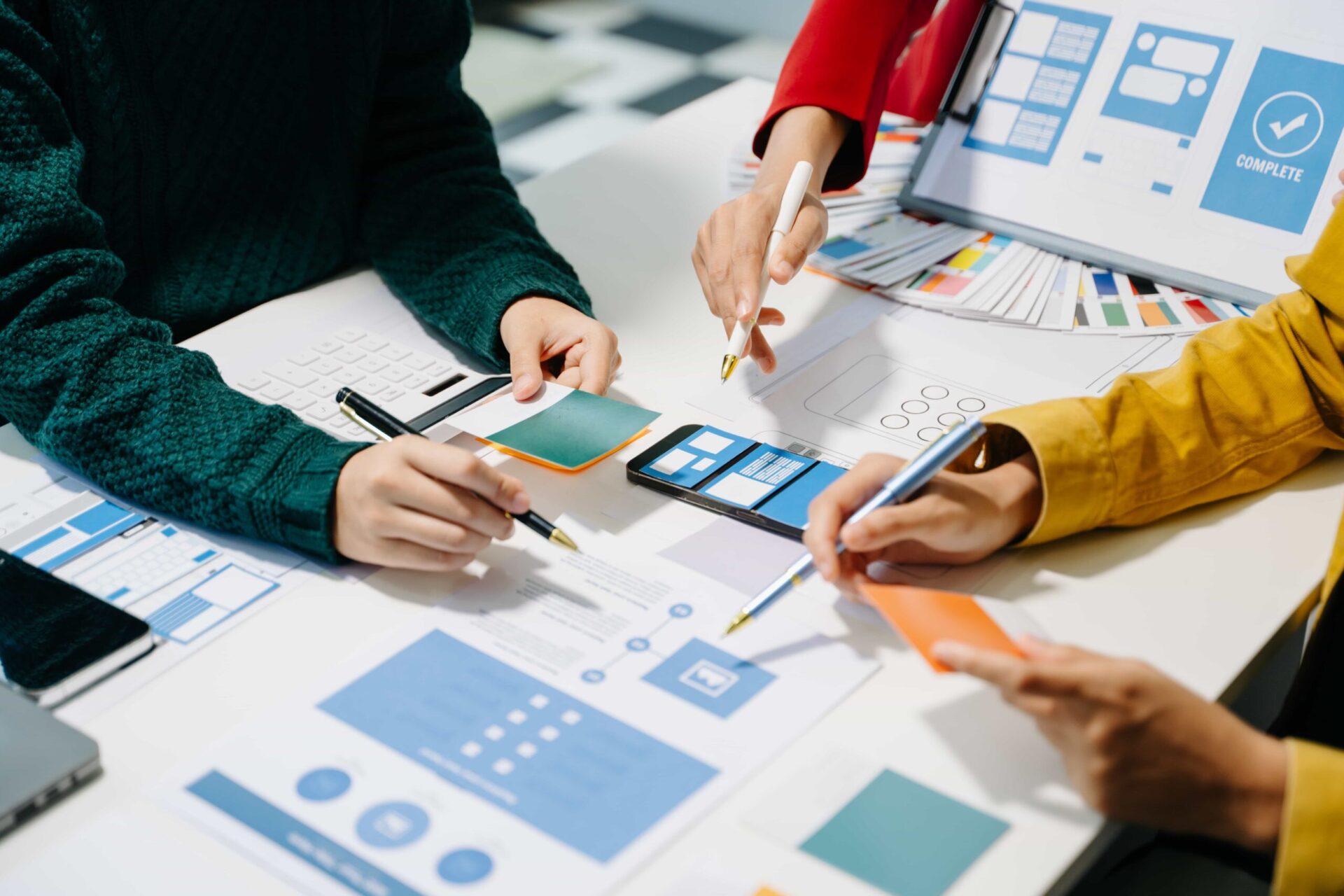 close-up-view-of-ui-developer-team-brainstorming-o-2024-09-21-04-22-58-utc